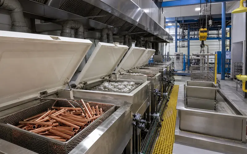 Metal pickling line preparing heat exchanger components for brazing